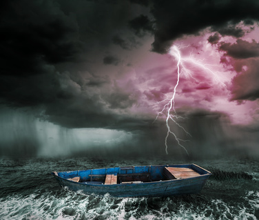 old boat in the stormy ocean